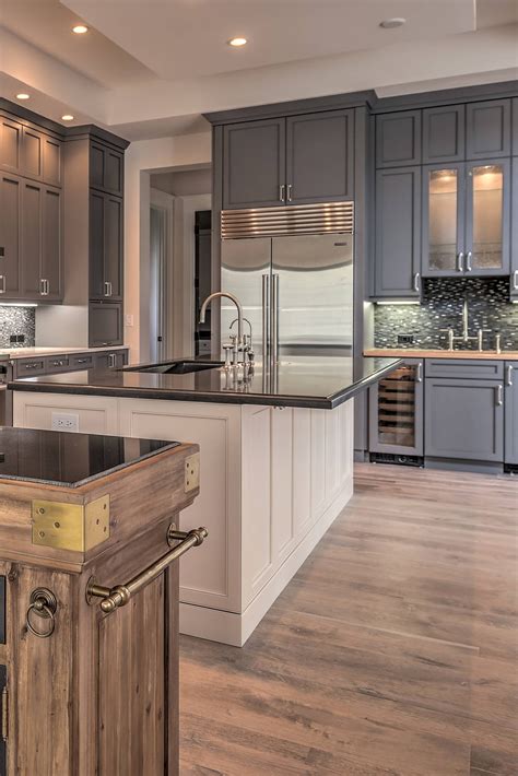 gray cabinets with dark countertops